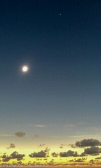 A fully eclipsed Sun with Venus and Mercury above it, observed from the Java Sea, Indonesia on March 9th 2016. Click for full-size image, 57 KB (Photograph  Joseph A Carr)