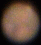Mars as it appears through a small astronomical telescope. The Southern polar cap and the triangular region called 'Syrtis Major' are clearly visible (Copyright Martin J Powell, 2011)